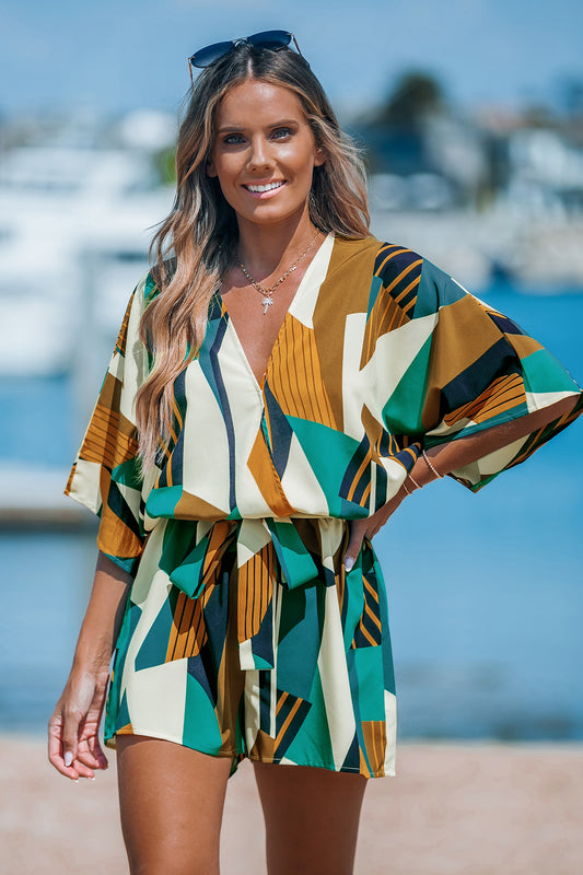 Abstrakter Geo-Dolman-Strampler mit geradem Bein